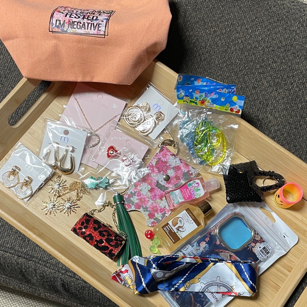Peach Canvas bag with new jewelry, accessories, & trinkets
